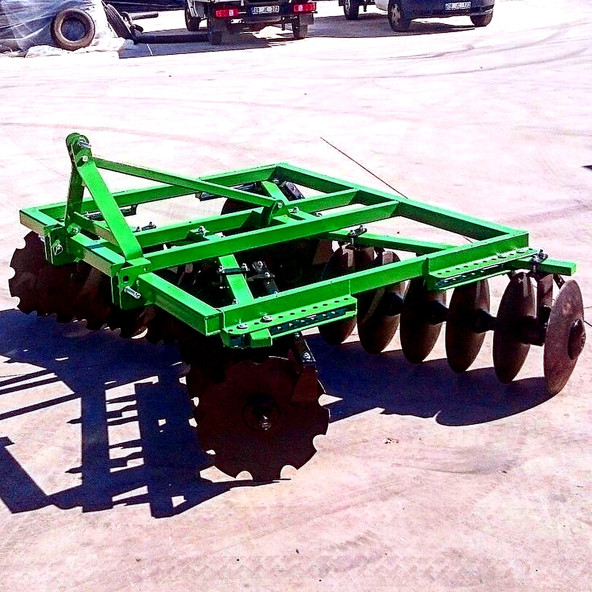 Green disc harrow farm implement