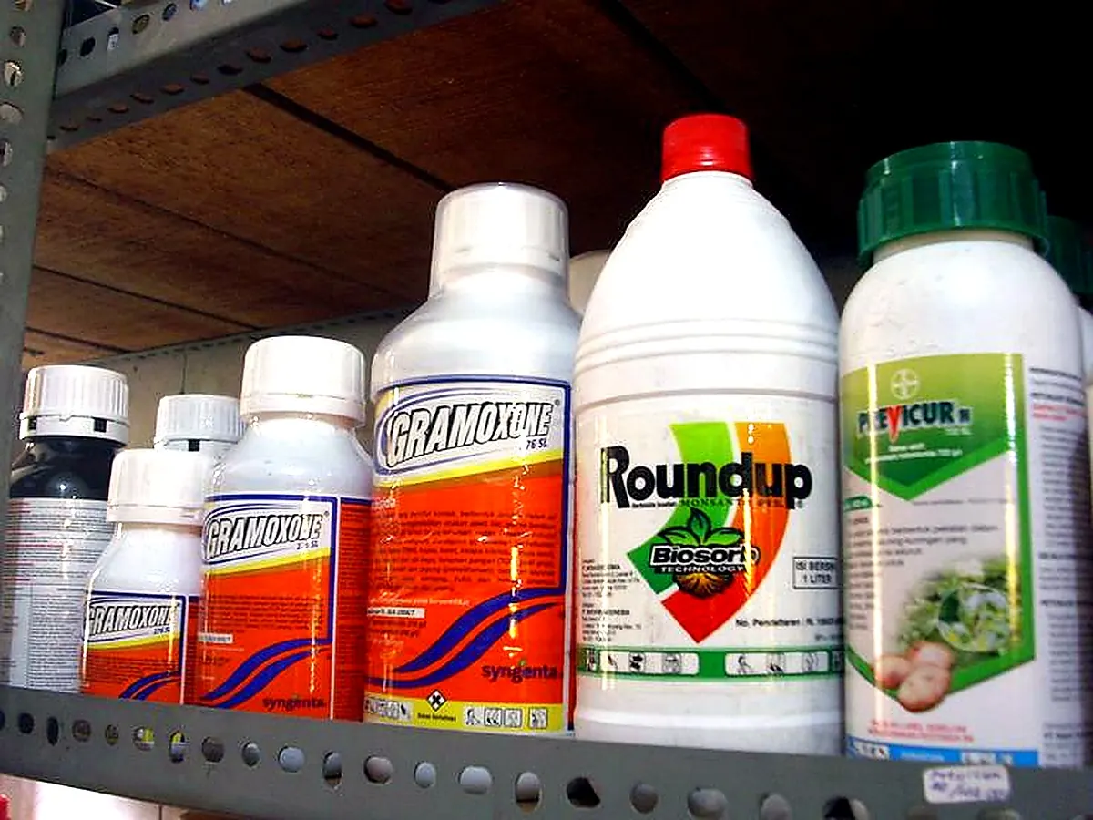 Agrochemical bottles and crop protection products on a shelf